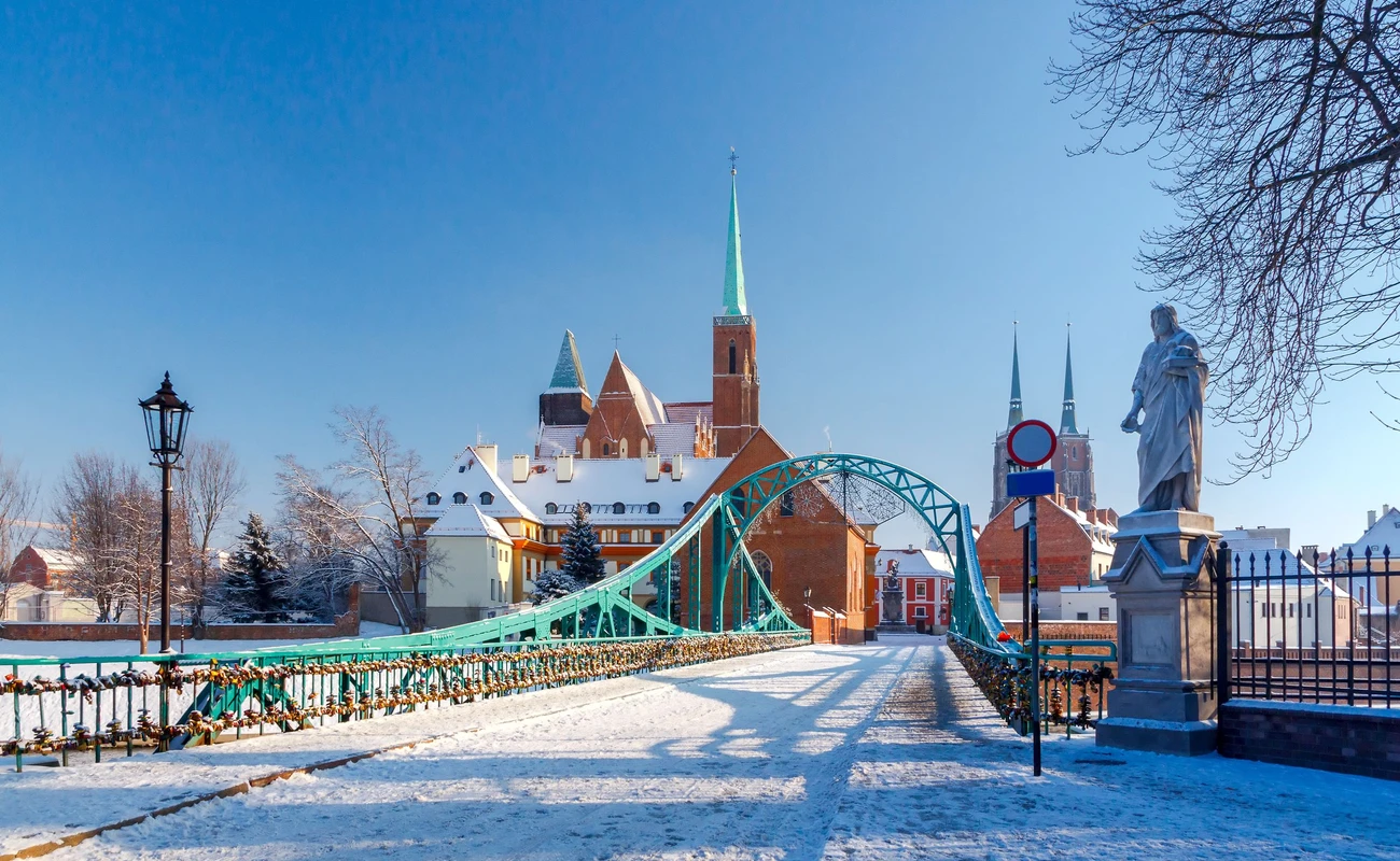 Tumski bridge over the river Odra to the island in winter.