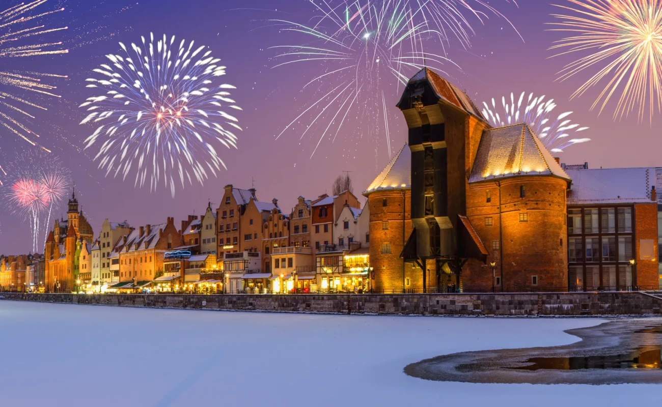Happy New Year fireworks.Winter scenery in Gdansk at night, Poland, Europe.
