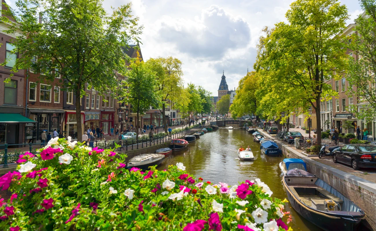 Canal in old city at daytime in Amsterdam.