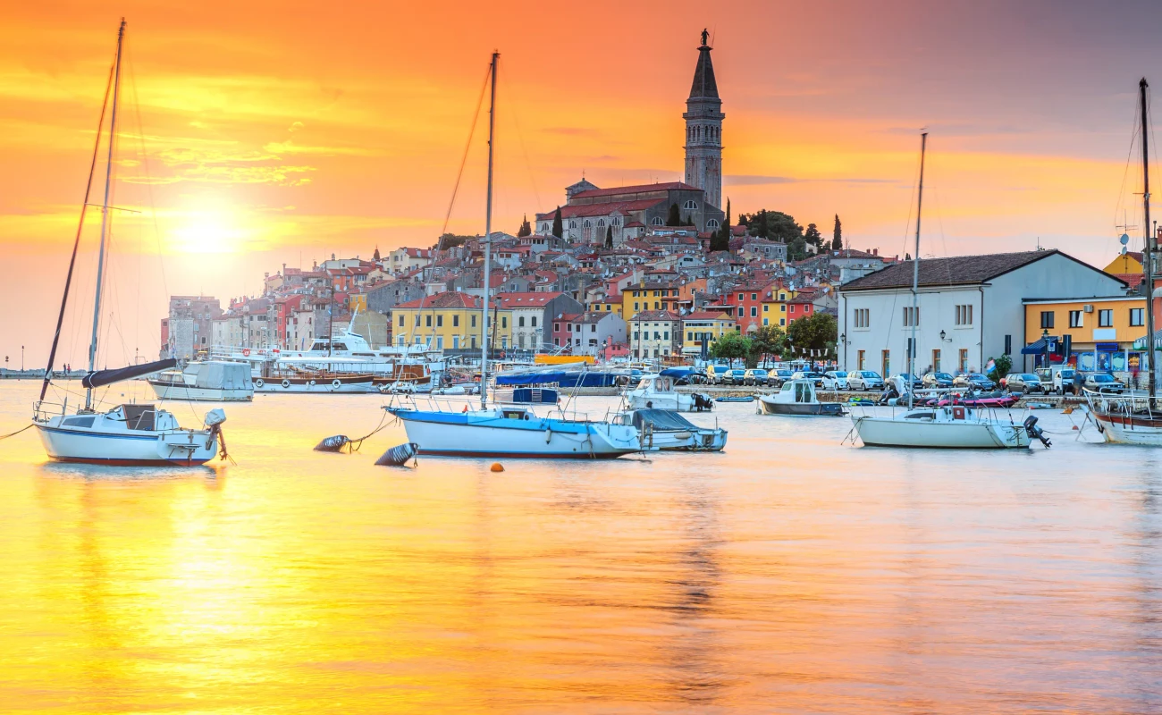 Wonderful romantic old town of Rovinj and famous fishing harbor with magical sunset,Istrian Peninsula,Croatia,Europe