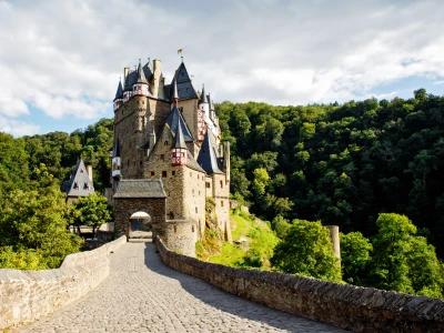 Eltz Castle, a medieval castle located in Germany, Rheinland Pfalz, Mosel region. Beautiful old castle, famous tourist attraction on sunny summer day, empty, without people, nobody.