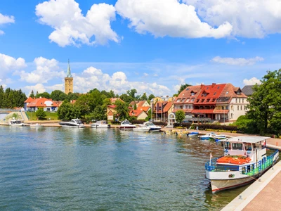 Tourist ship in Mikolajki port on sunny summer day, Mazury Lake District, Poland