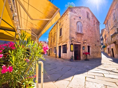 Sunny stone street of ancient Pula view, Istria region of Croatia