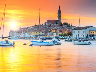 Wonderful romantic old town of Rovinj and famous fishing harbor with magical sunset,Istrian Peninsula,Croatia,Europe
